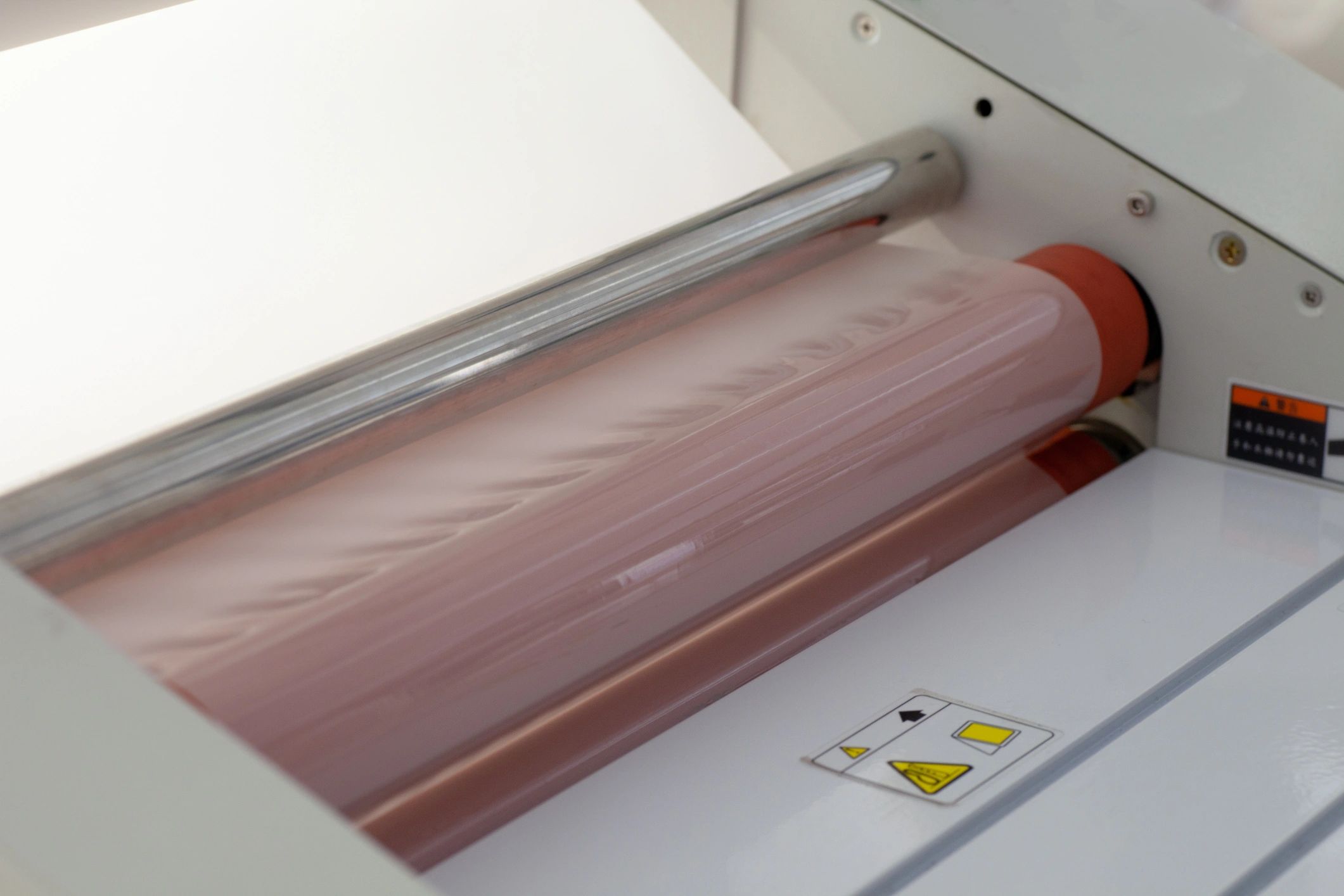 Industrial laminating film process close-up