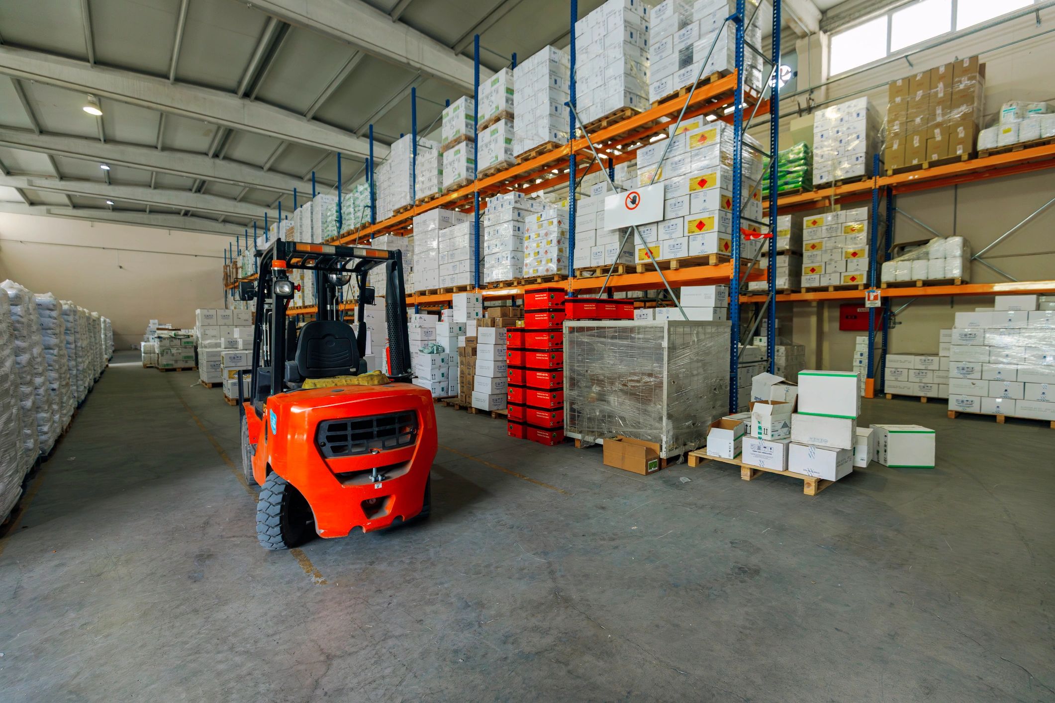 Organized industrial packaging warehouse supporting reliable supply